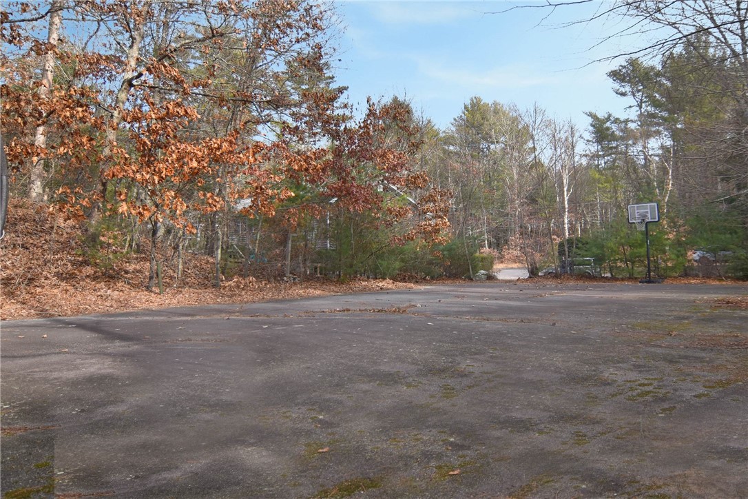 153 Fairview Avenue Hopkinton, RI 02832 - Photo 34 of 35 Blacktop area for basketball or similar activity.