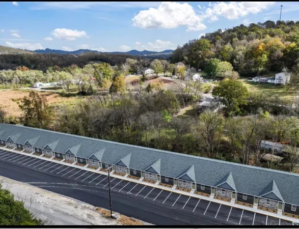 a view of a balcony with two chairs