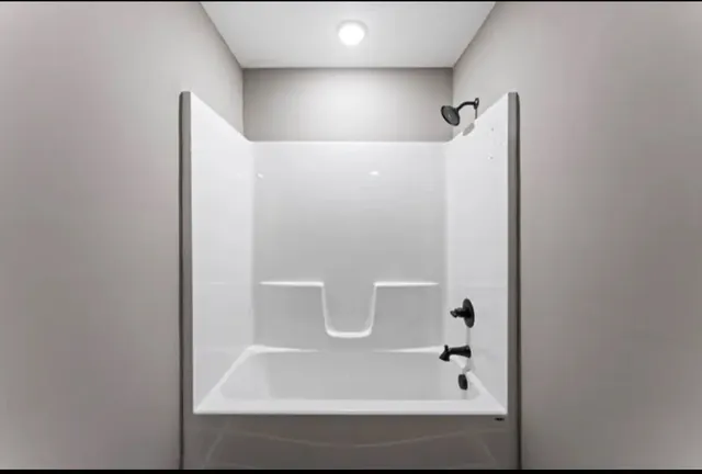 a bathroom with a bathtub