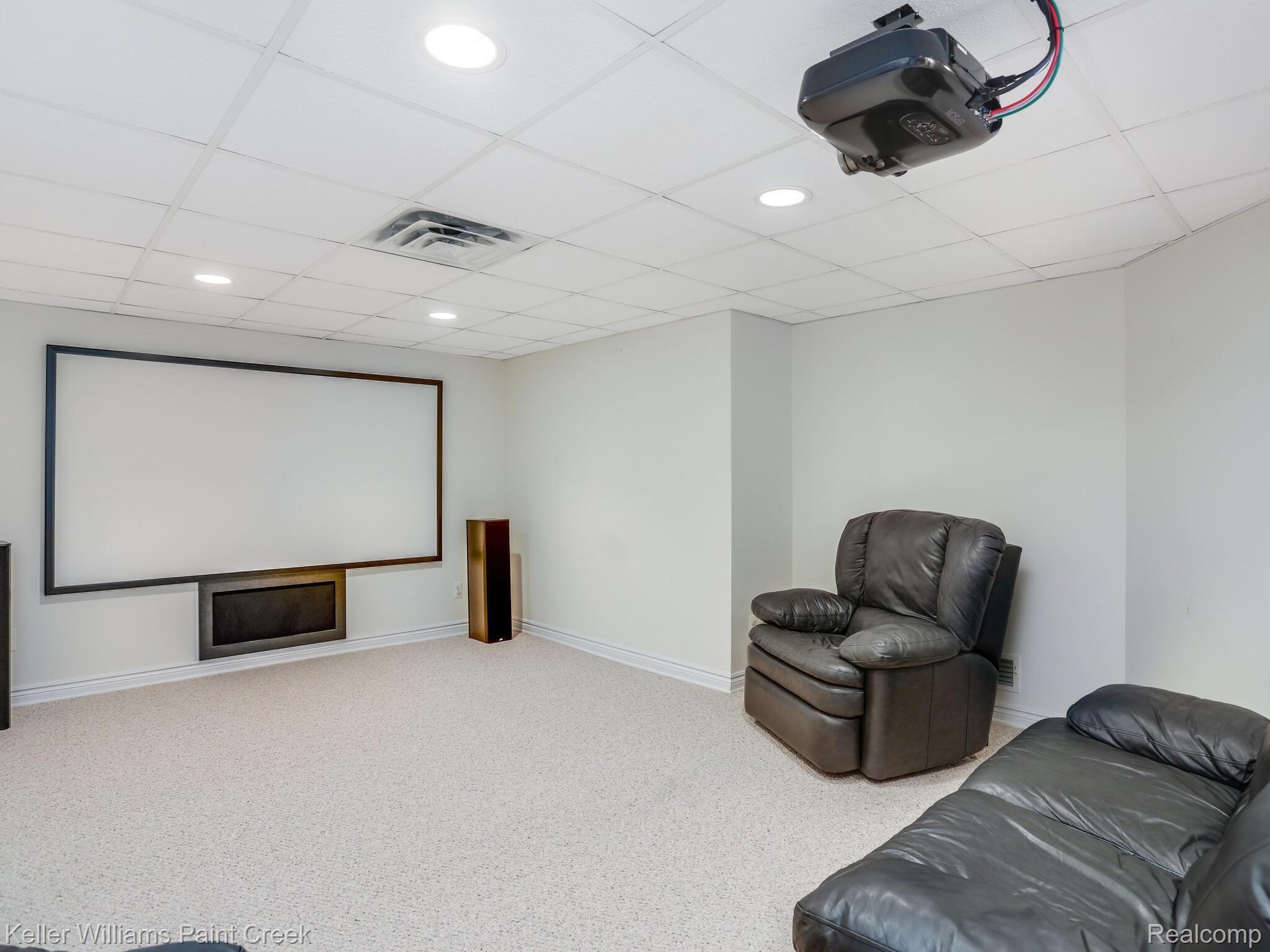 5655 Kirkridge Trail Rochester, MI 48306 - Photo 27 of 34 Home theater for family movie nights.
