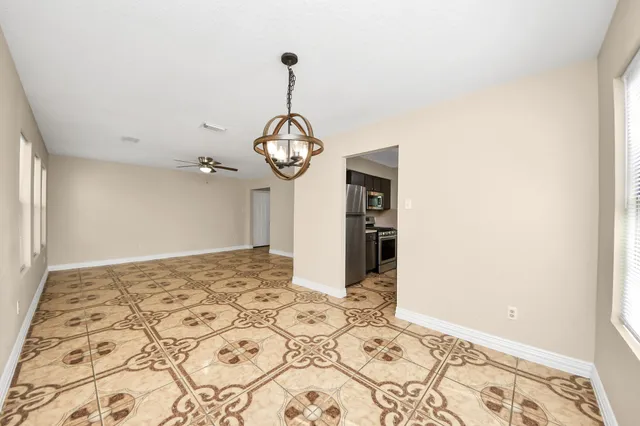 a view of a hallway to a room