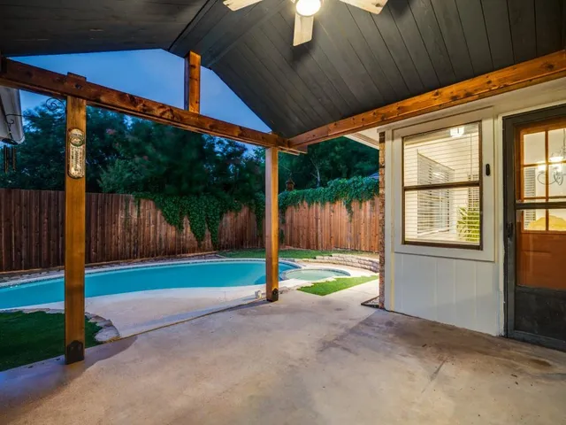 a view of backyard with green space