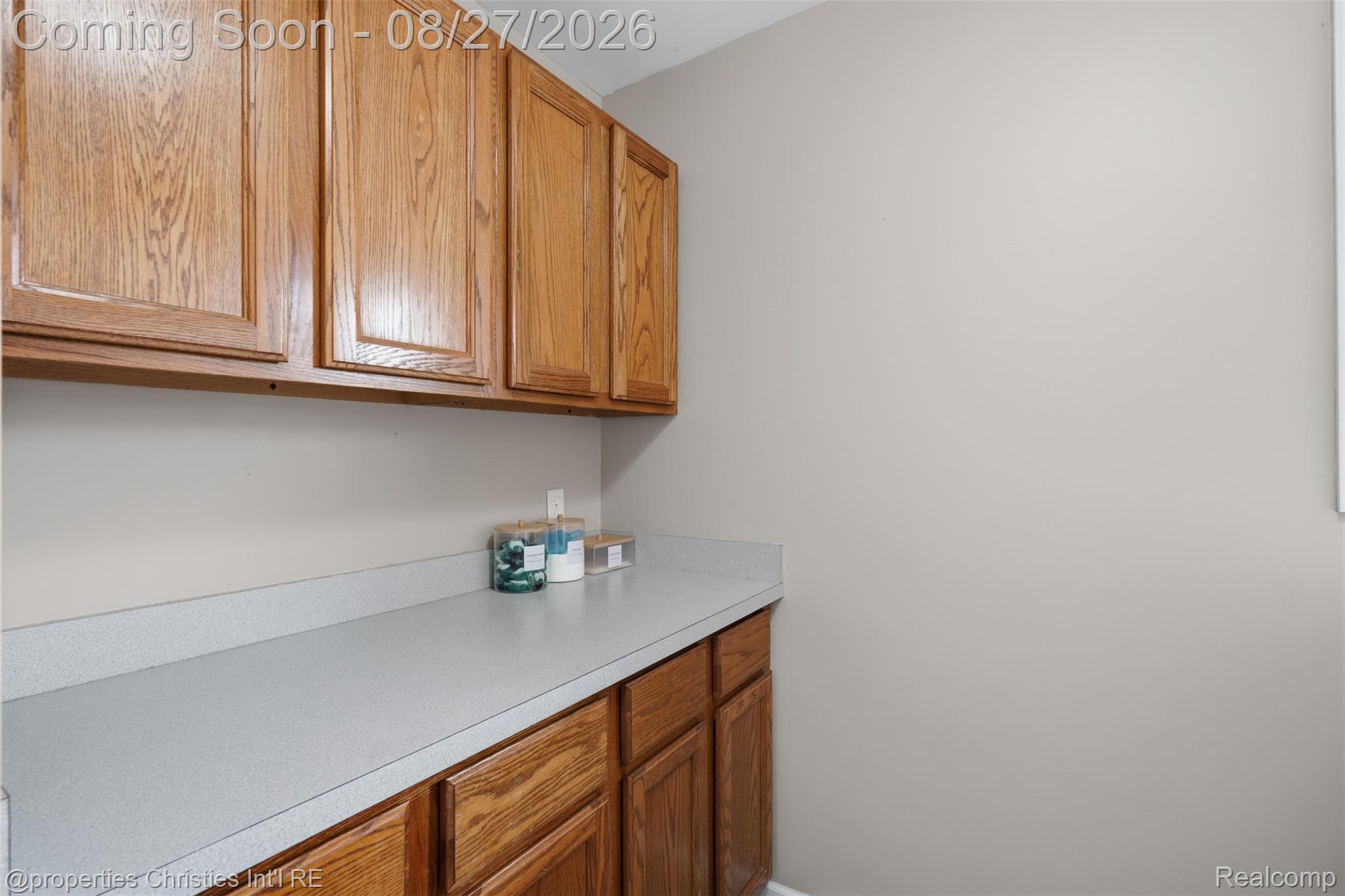 8104 Flintlock Road Mount Morris, MI 48458 - Photo 22 of 42 Second Floor Laundry with Cabinets 26_8104 flintlock rd-26.jpg