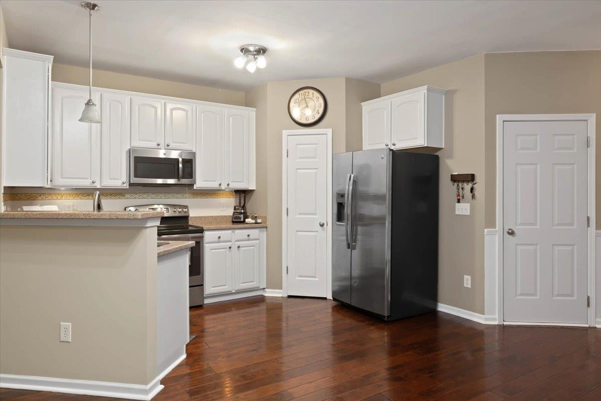3005 Winding Waters Way Raleigh, NC 27614 - Photo 6 of 34 Granite countertops and stainless steel appliances Kitchen