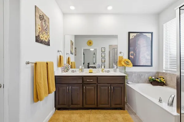 a bathroom with a sink and a bathtub