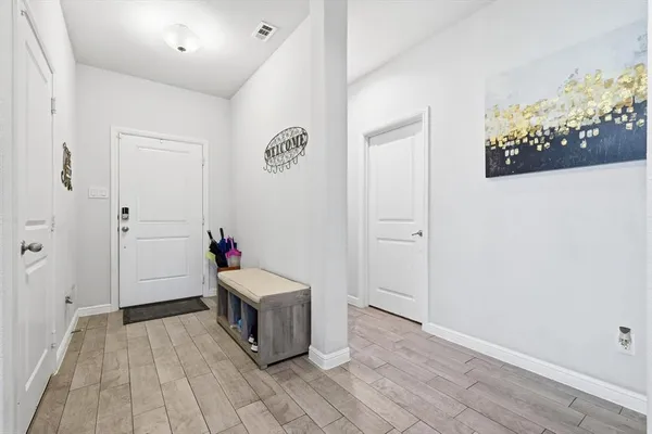 a living room with a baby bed