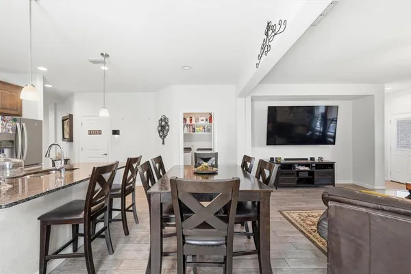 a view of a dining room with furniture
