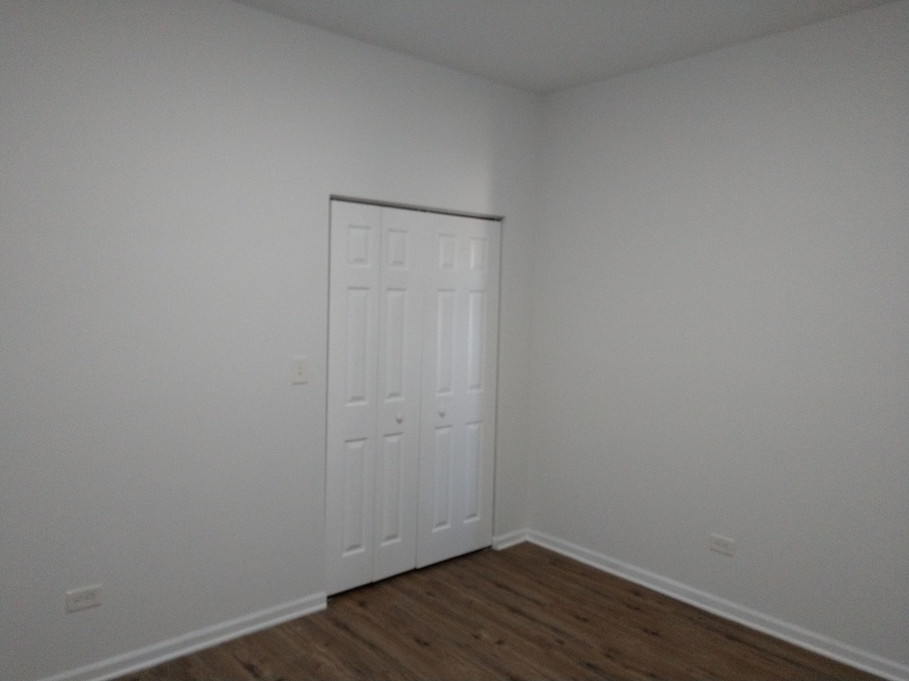 6219 South Rhodes Avenue Chicago, IL 60637 - Photo 18 of 24 a view of small space with wooden floor