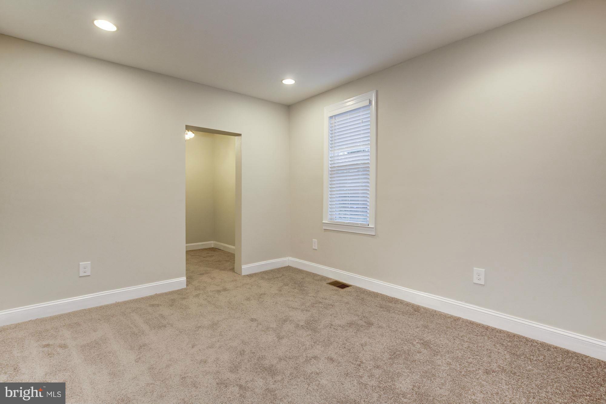 1241 Jackson Street Northeast Washington, DC 20017 - Photo 13 of 30 an empty room with windows