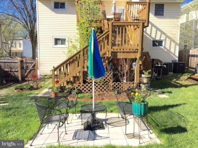 1241 Jackson Street Northeast Washington, DC 20017 - Photo 29 of 30 a view of a chairs and table in the backyard