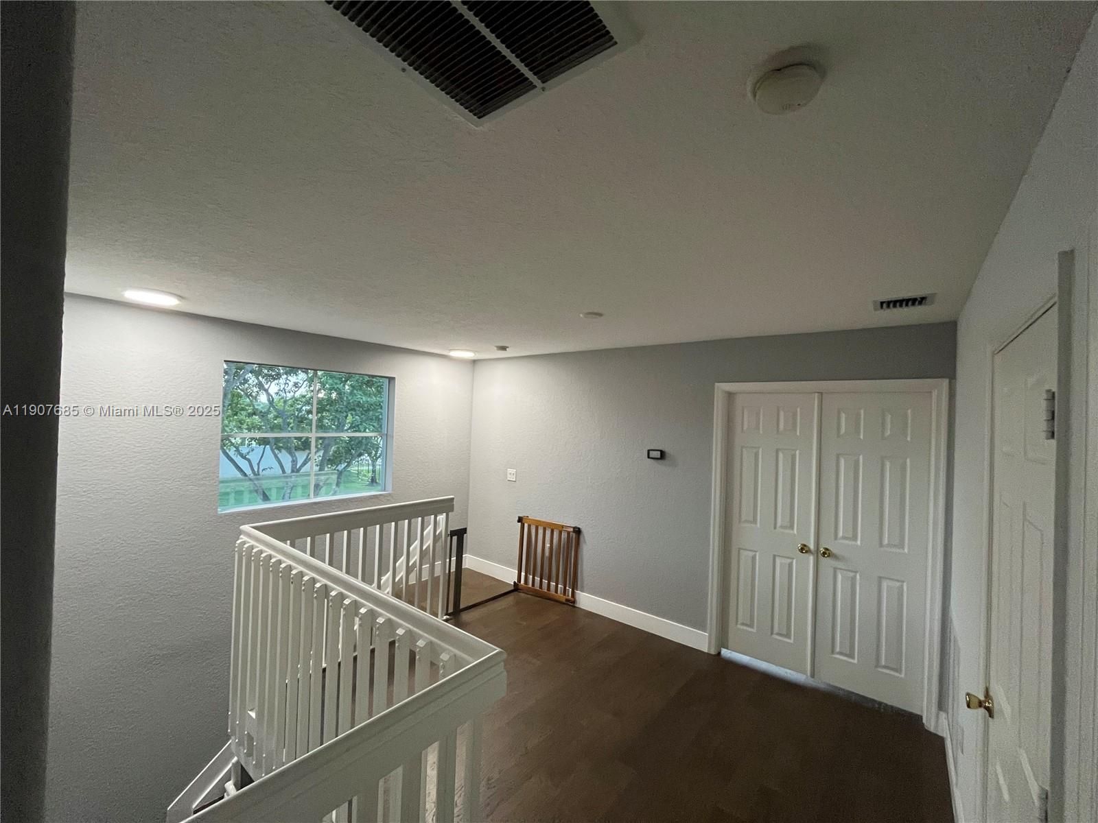 4790 Southwest 165th Avenue Miramar, FL 33027 - Photo 14 of 31 a view of room with stairs and windows
