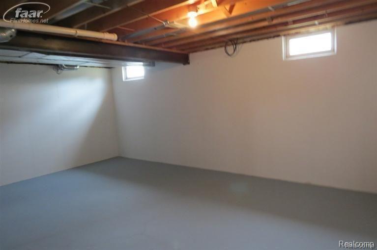 9090 Linden Road Swartz Creek, MI 48473 - Photo 8 of 12 Pleasantly painted basement