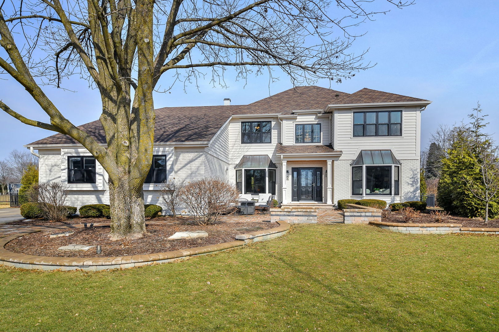 a front view of a house with swimming pool