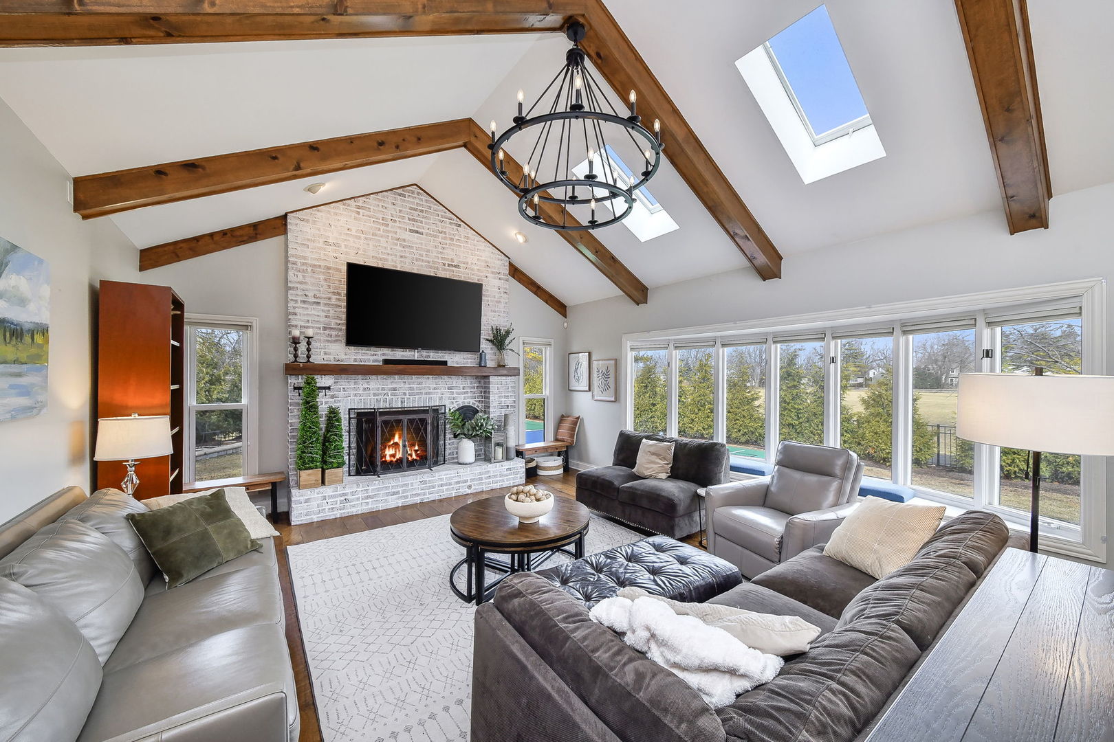 75 Hawkins Circle Wheaton, IL 60189 - Photo 14 of 45 a living room with furniture a fireplace and a flat screen tv
