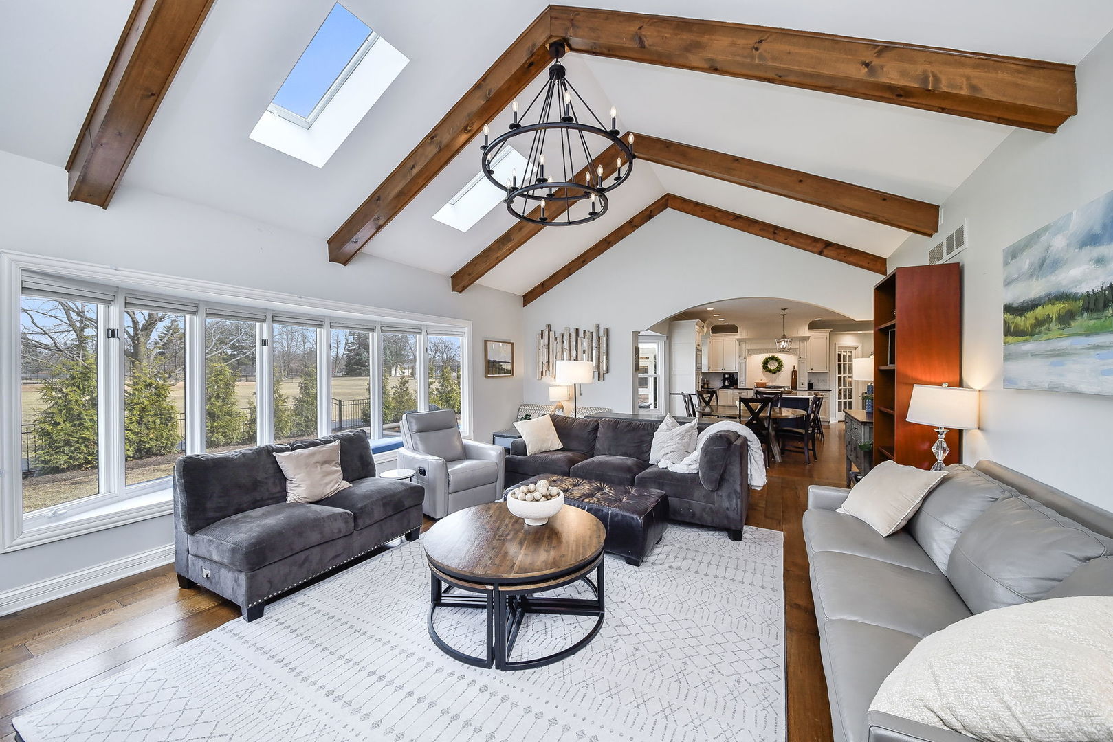 75 Hawkins Circle Wheaton, IL 60189 - Photo 16 of 45 a living room with furniture a fireplace and a large window
