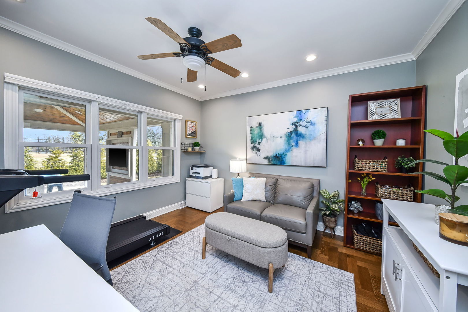 75 Hawkins Circle Wheaton, IL 60189 - Photo 17 of 45 a living room with furniture and a flat screen tv