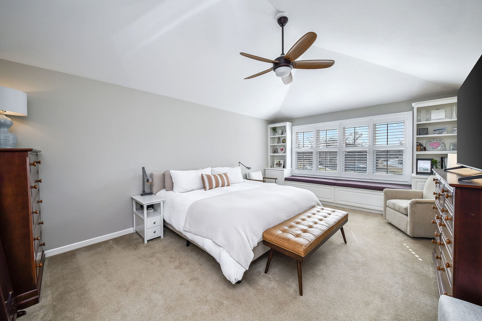 75 Hawkins Circle Wheaton, IL 60189 - Photo 21 of 45 a spacious bedroom with a bed and a large window