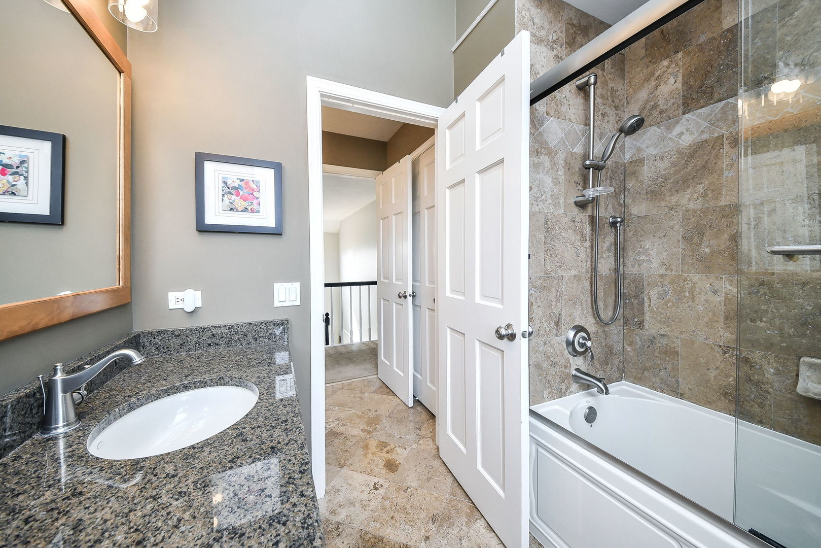 75 Hawkins Circle Wheaton, IL 60189 - Photo 30 of 45 a bathroom with a granite countertop sink mirror and shower