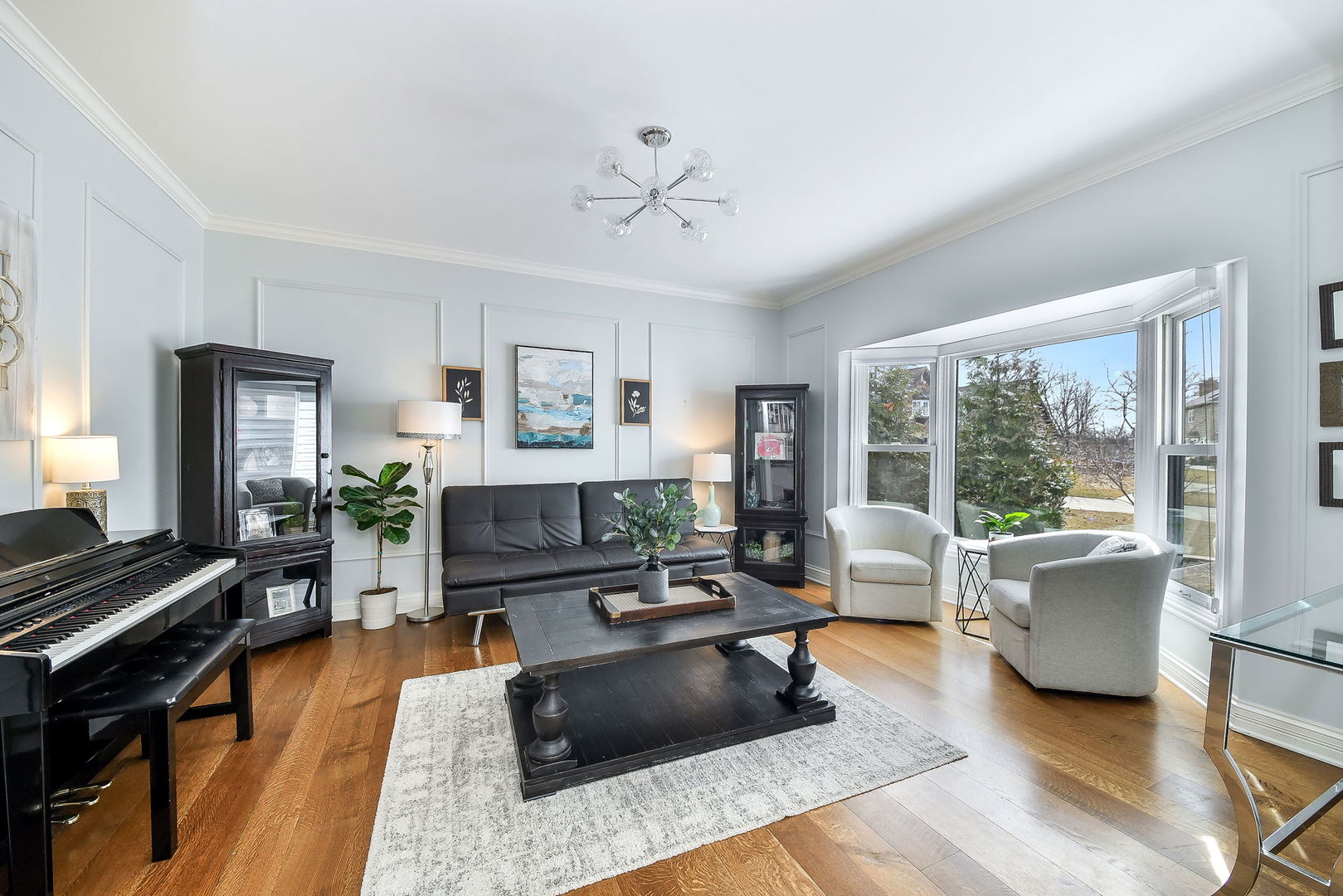 75 Hawkins Circle Wheaton, IL 60189 - Photo 5 of 45 a living room with furniture and a flat screen tv
