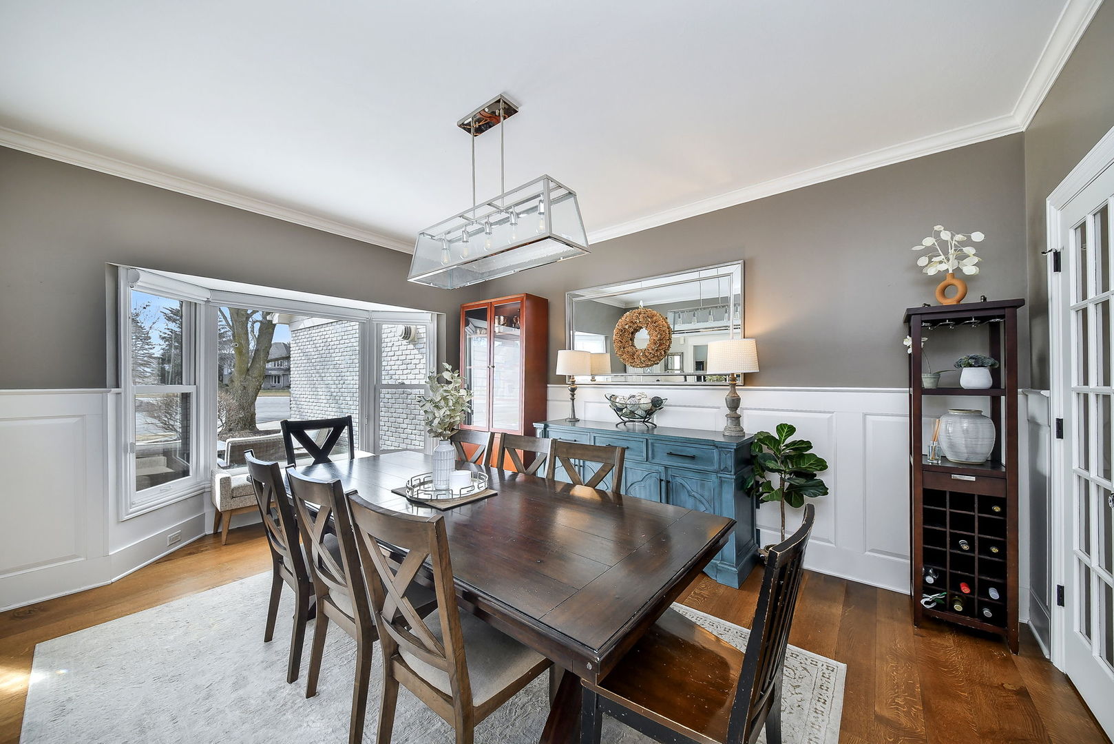 75 Hawkins Circle Wheaton, IL 60189 - Photo 7 of 45 a view of a dining room with furniture window and wooden floor