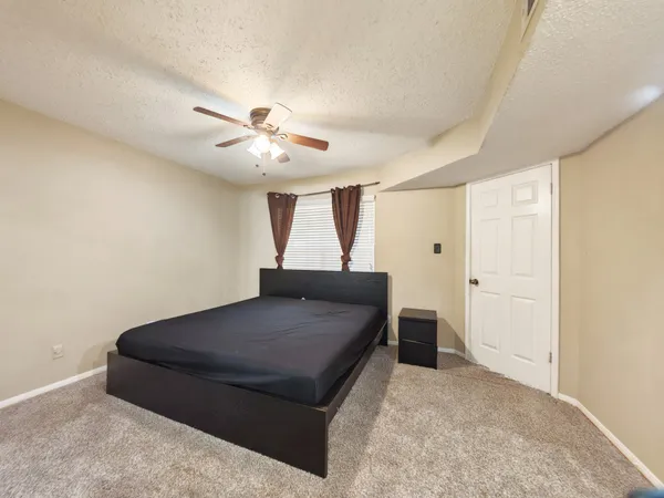 a living room with furniture and window