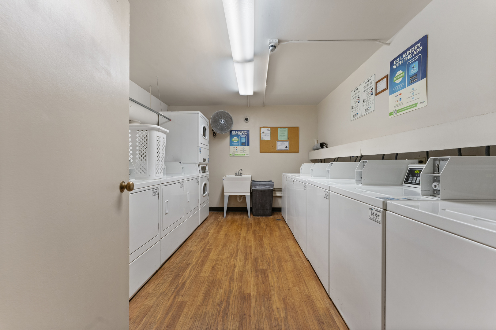 1500 Robin Circle, Unit 203 Hoffman Estates, IL 60169 - Photo 13 of 13 a view of a kitchen with fridge and wooden floor