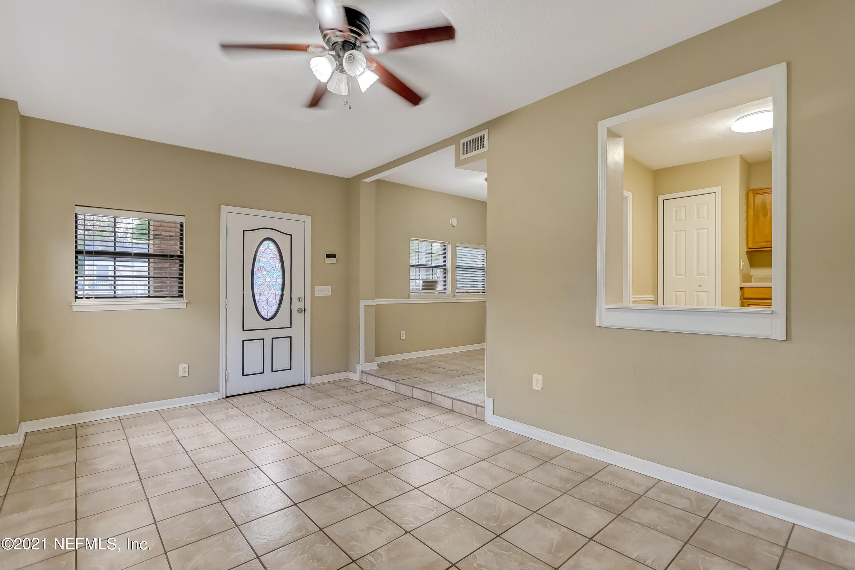 5207 Sunderland Road Jacksonville, FL 32210 - Photo 7 of 23 a view of a livingroom with window
