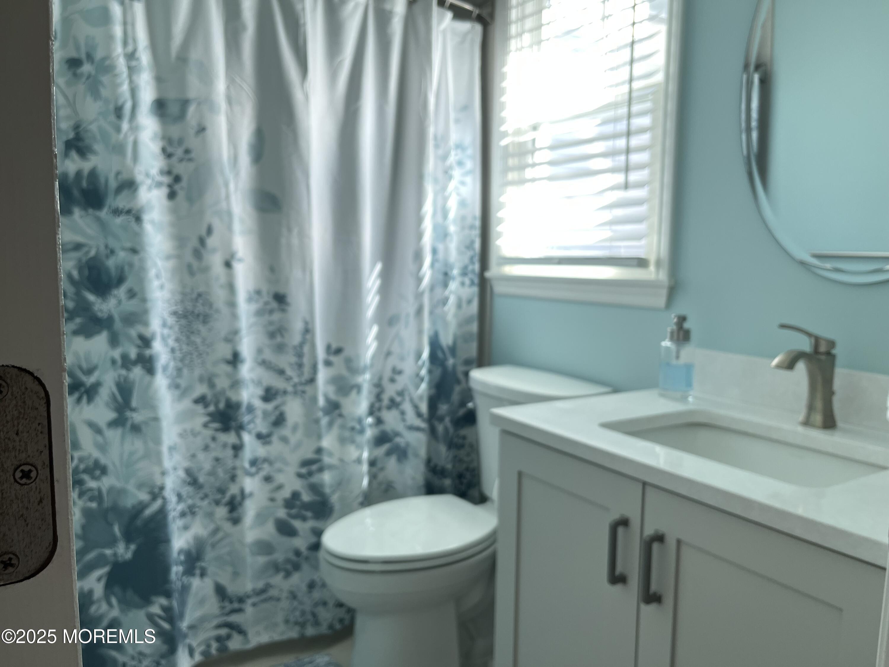 Undisclosed Address Bradley Beach, NJ 07720 - Photo 13 of 13 a bathroom with a sink a toilet and shower