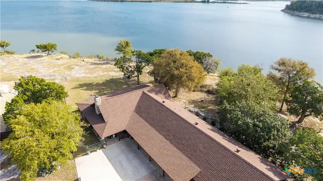 a view of a balcony with floor to ceiling windows