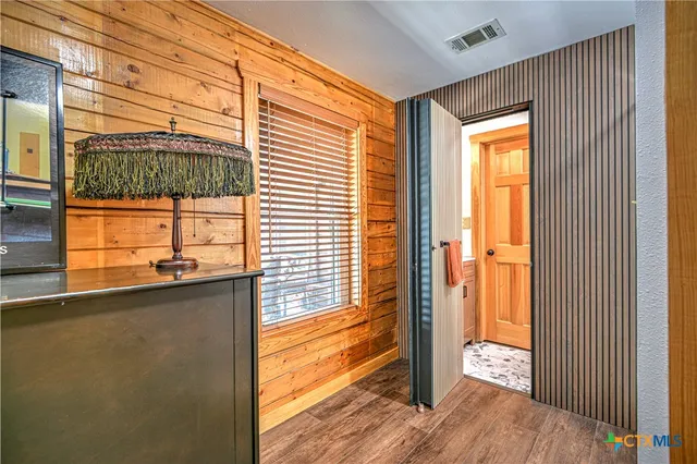 a view of a living room with a large window