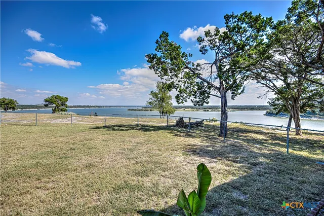 a view of a yard with an outdoor space