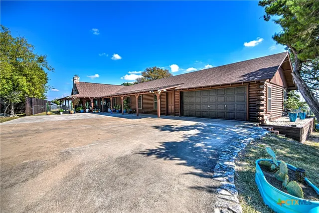 a house with yard in front of it