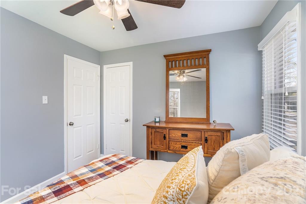 4235 Sudbury Road Charlotte, NC 28205 - Photo 25 of 29 a bedroom with a bed and a window