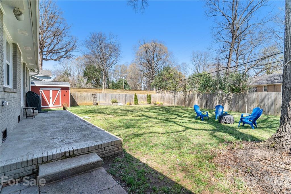 4235 Sudbury Road Charlotte, NC 28205 - Photo 29 of 29 a view of a backyard with sitting area