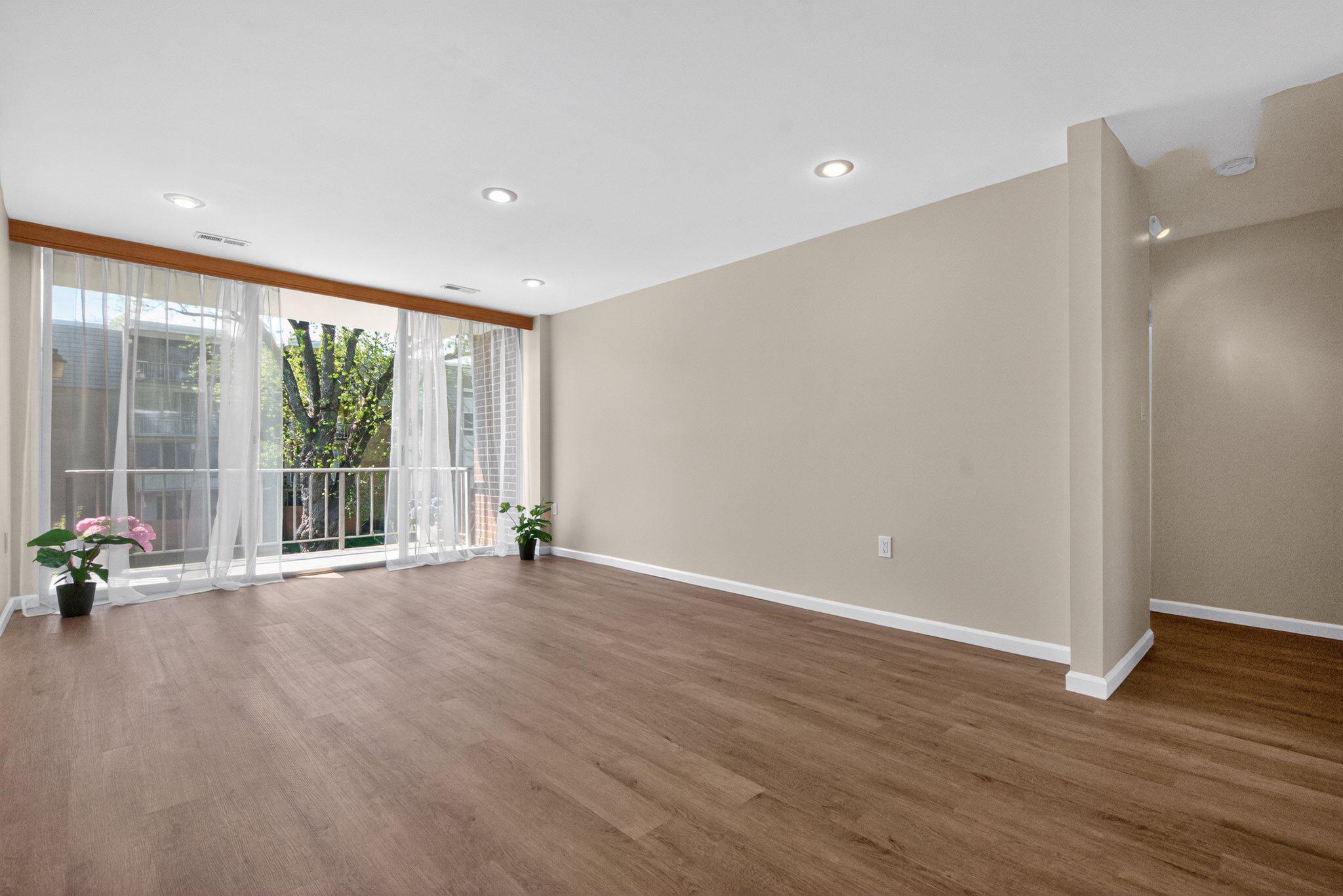 3932 Bel Pre Road, Unit 39326 Silver Spring, MD 20906 - Photo 1 of 20 Bright and airy living room with large balcony.