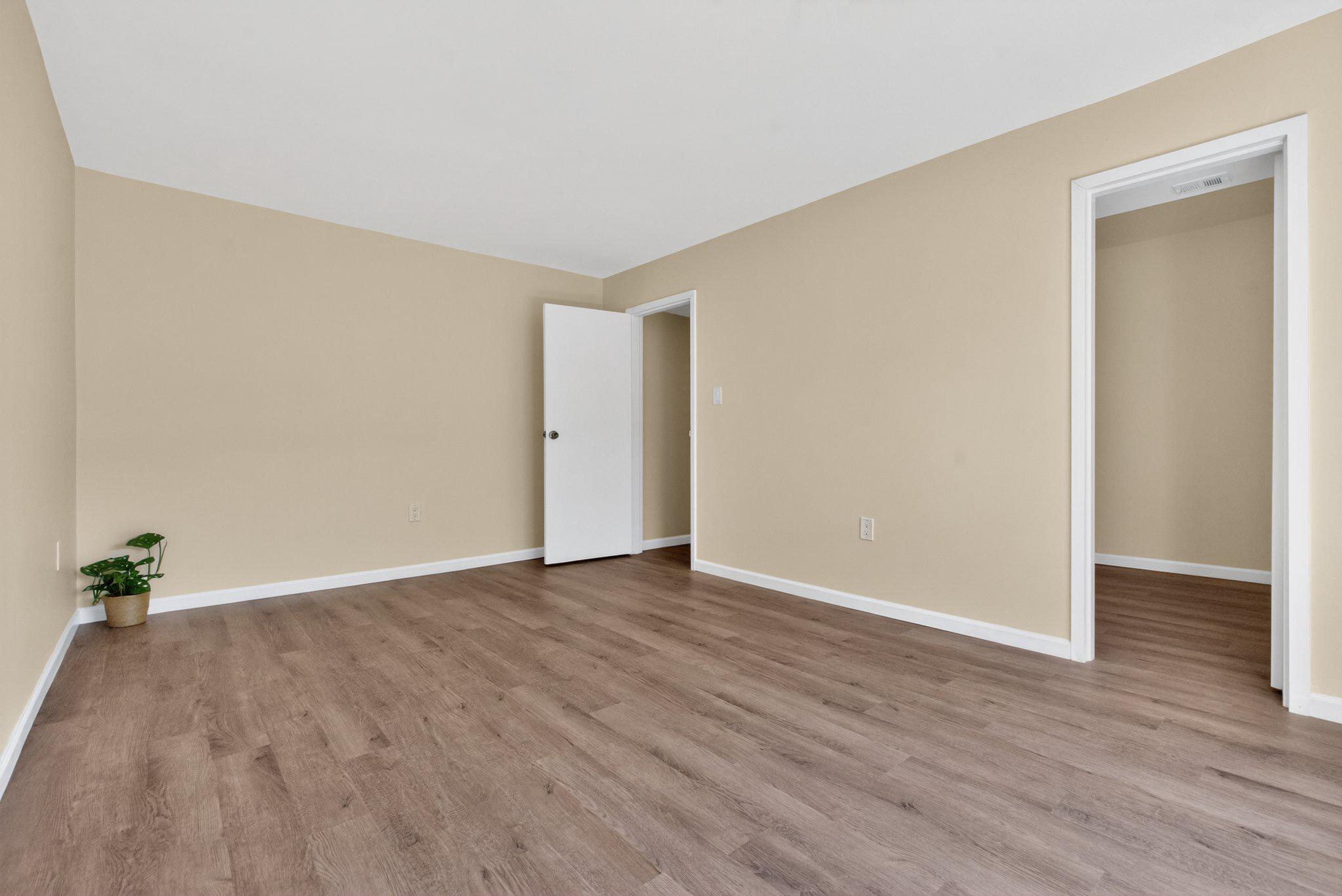 3932 Bel Pre Road, Unit 39326 Silver Spring, MD 20906 - Photo 11 of 20 Spacious bedroom with warm, inviting tones.