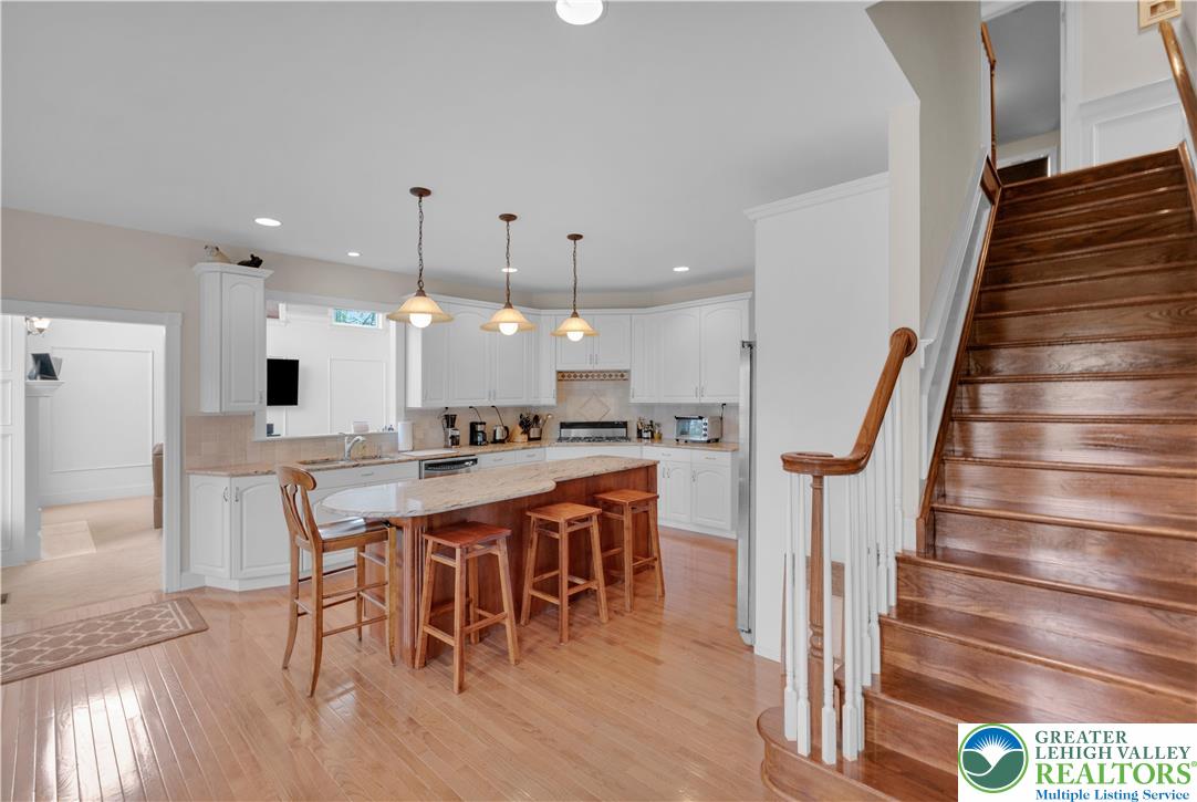 774 Lahr Road Nazareth, PA 18064 - Photo 18 of 58 a open kitchen with a table and chairs