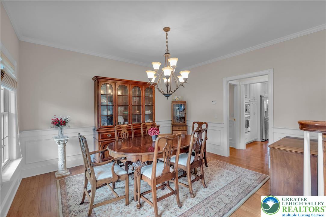 774 Lahr Road Nazareth, PA 18064 - Photo 21 of 58 a view of a dining room with furniture and wooden floor