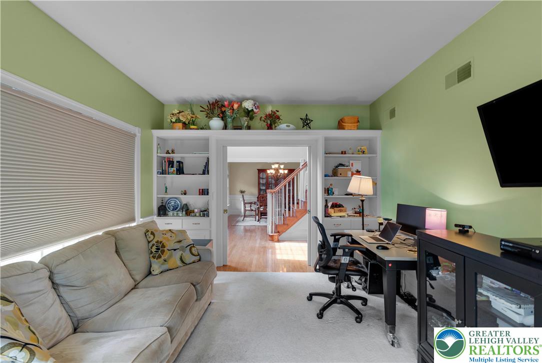 774 Lahr Road Nazareth, PA 18064 - Photo 24 of 58 a living room with furniture and a flat screen tv