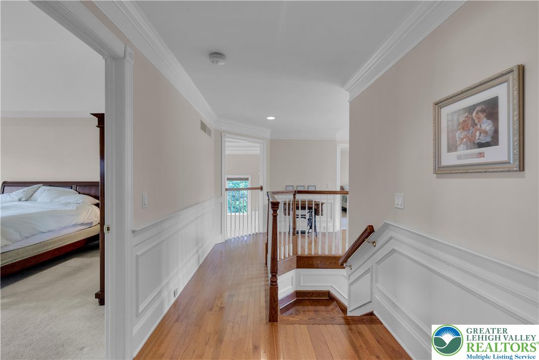 774 Lahr Road Nazareth, PA 18064 - Photo 27 of 58 a view of a hallway with furniture and wooden floor