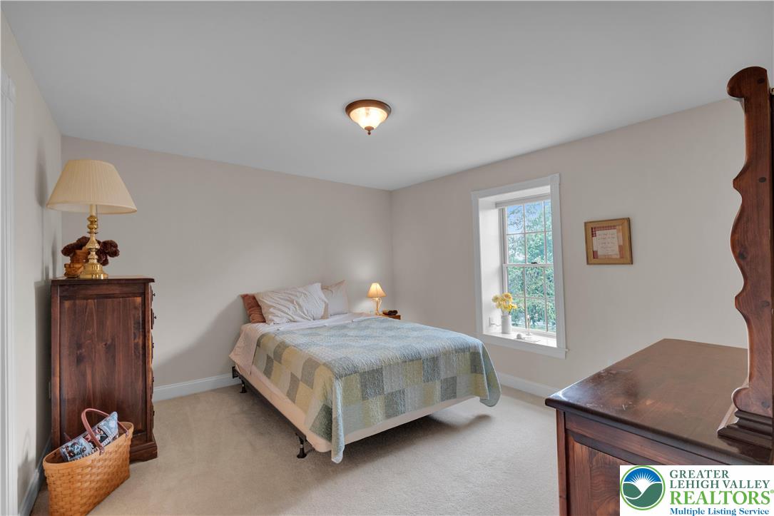 774 Lahr Road Nazareth, PA 18064 - Photo 31 of 58 a bedroom with a bed and a window