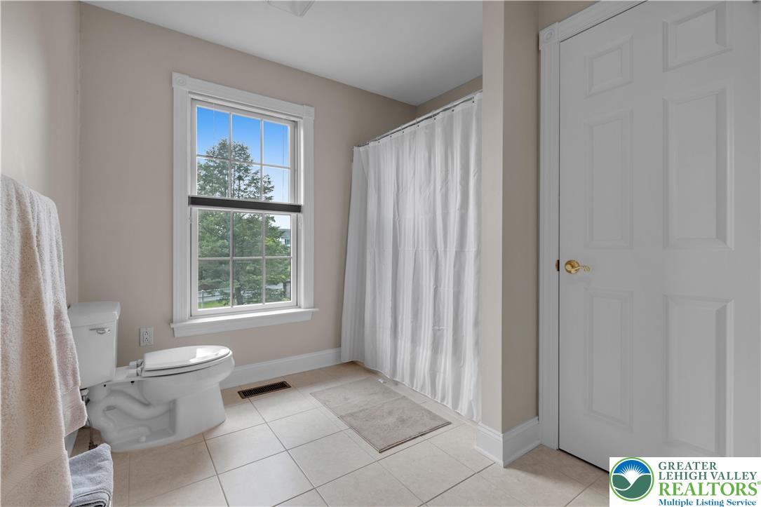 774 Lahr Road Nazareth, PA 18064 - Photo 35 of 58 a bathroom with a toilet and a window