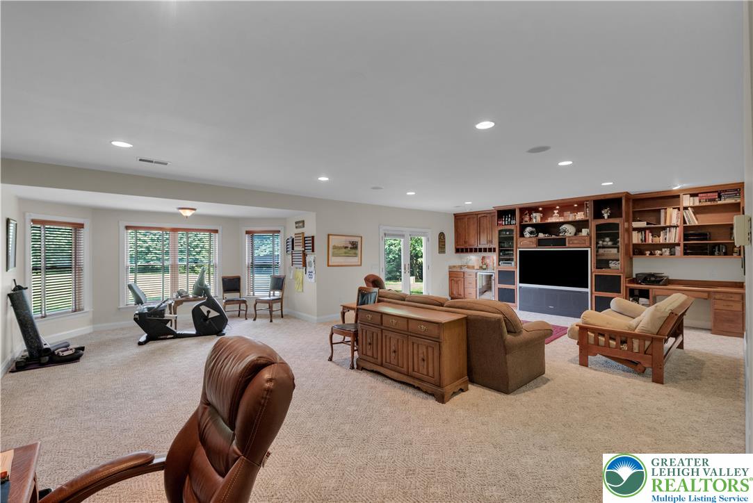 774 Lahr Road Nazareth, PA 18064 - Photo 41 of 58 a living room with fireplace furniture and a large window