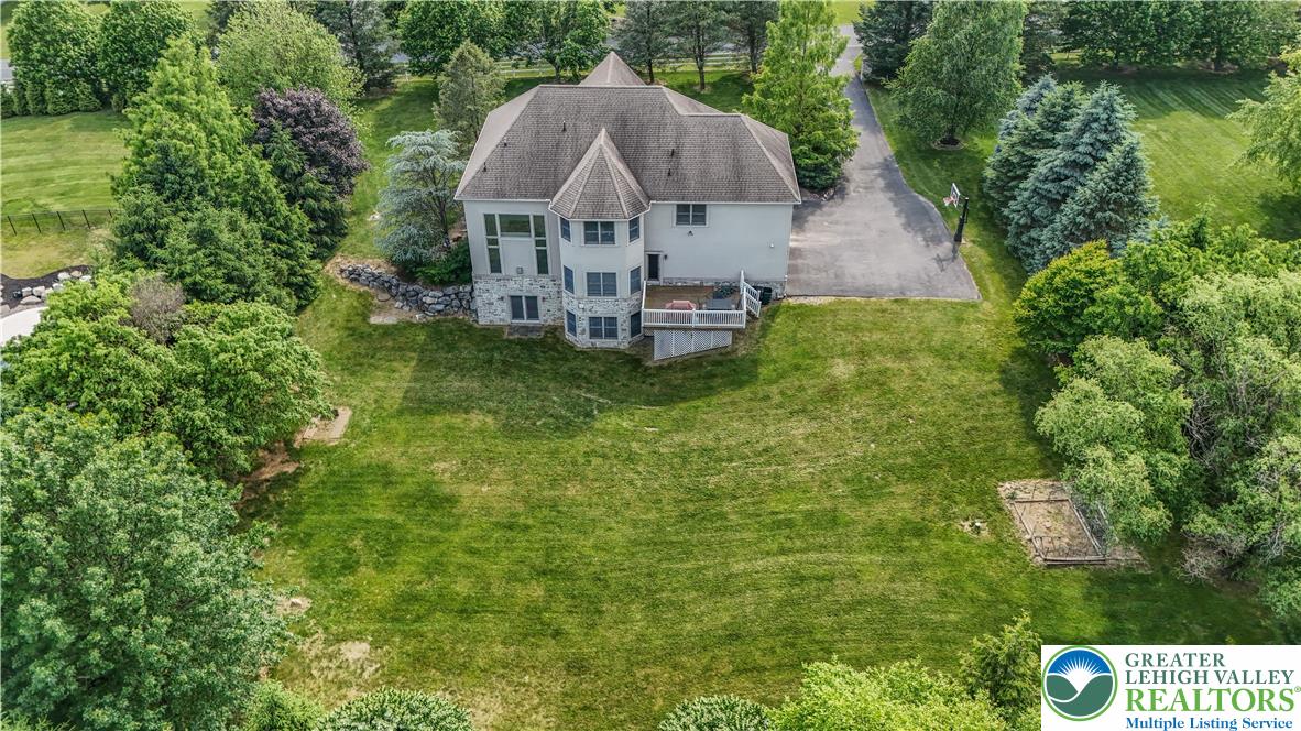 774 Lahr Road Nazareth, PA 18064 - Photo 46 of 58 a aerial view of a house with swimming pool garden view and trees