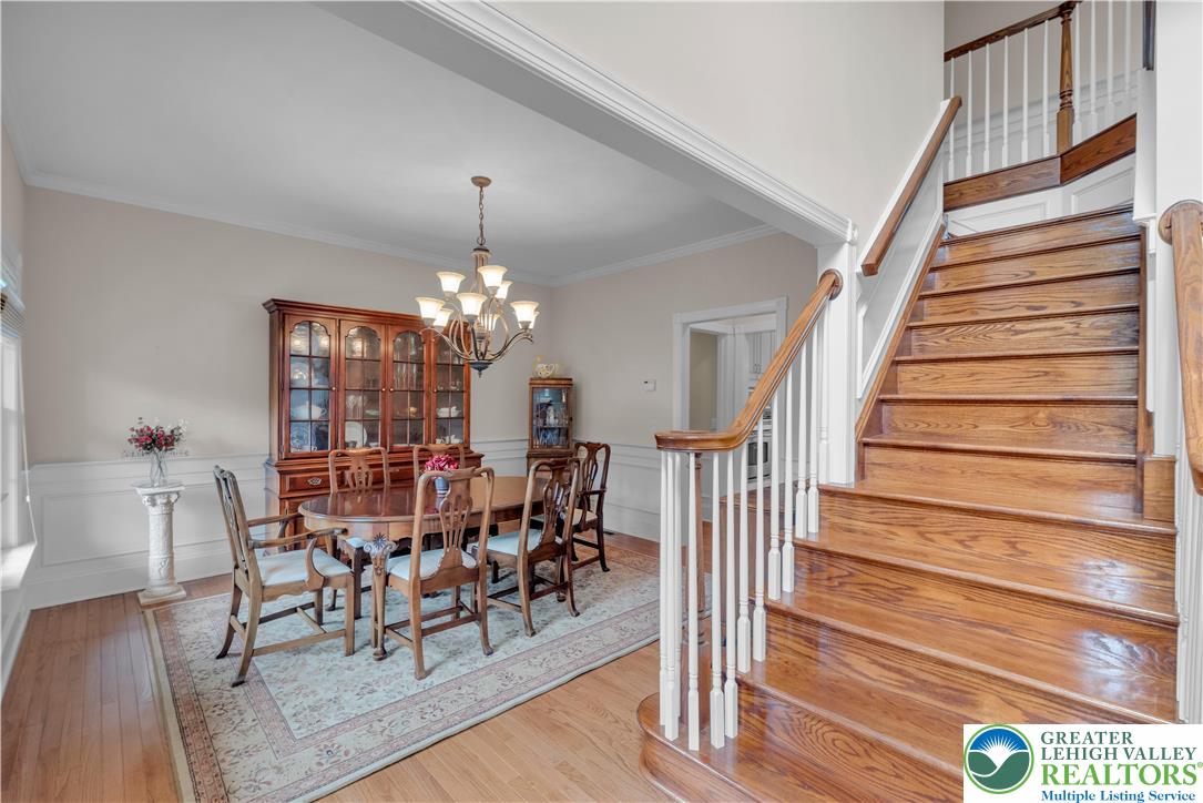 774 Lahr Road Nazareth, PA 18064 - Photo 10 of 58 a view of a dining room with furniture and wooden floor