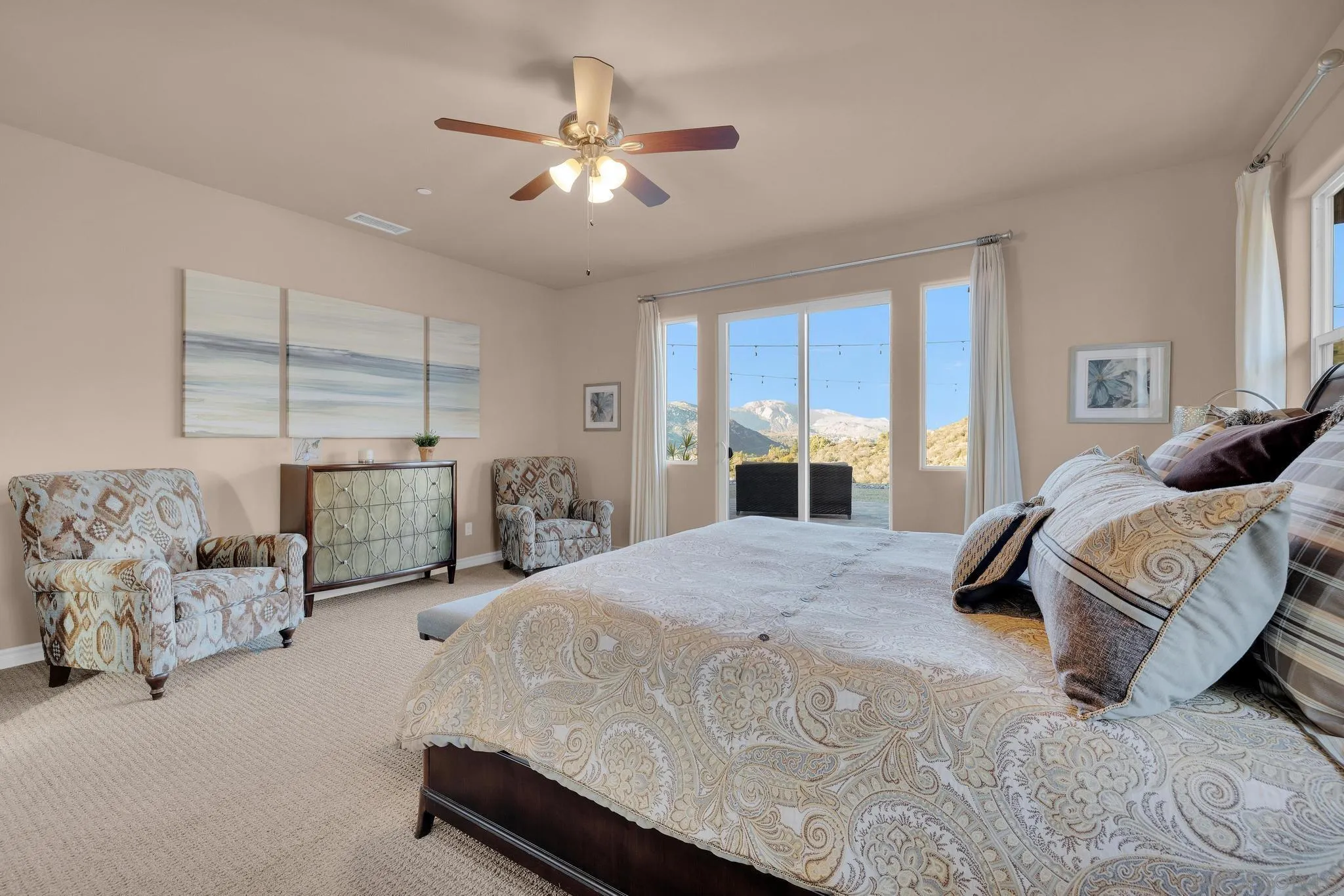 578 North Alpine Trail Road Alpine, CA 91901 - Photo 17 of 50 a spacious bedroom with a bed and ceiling fan