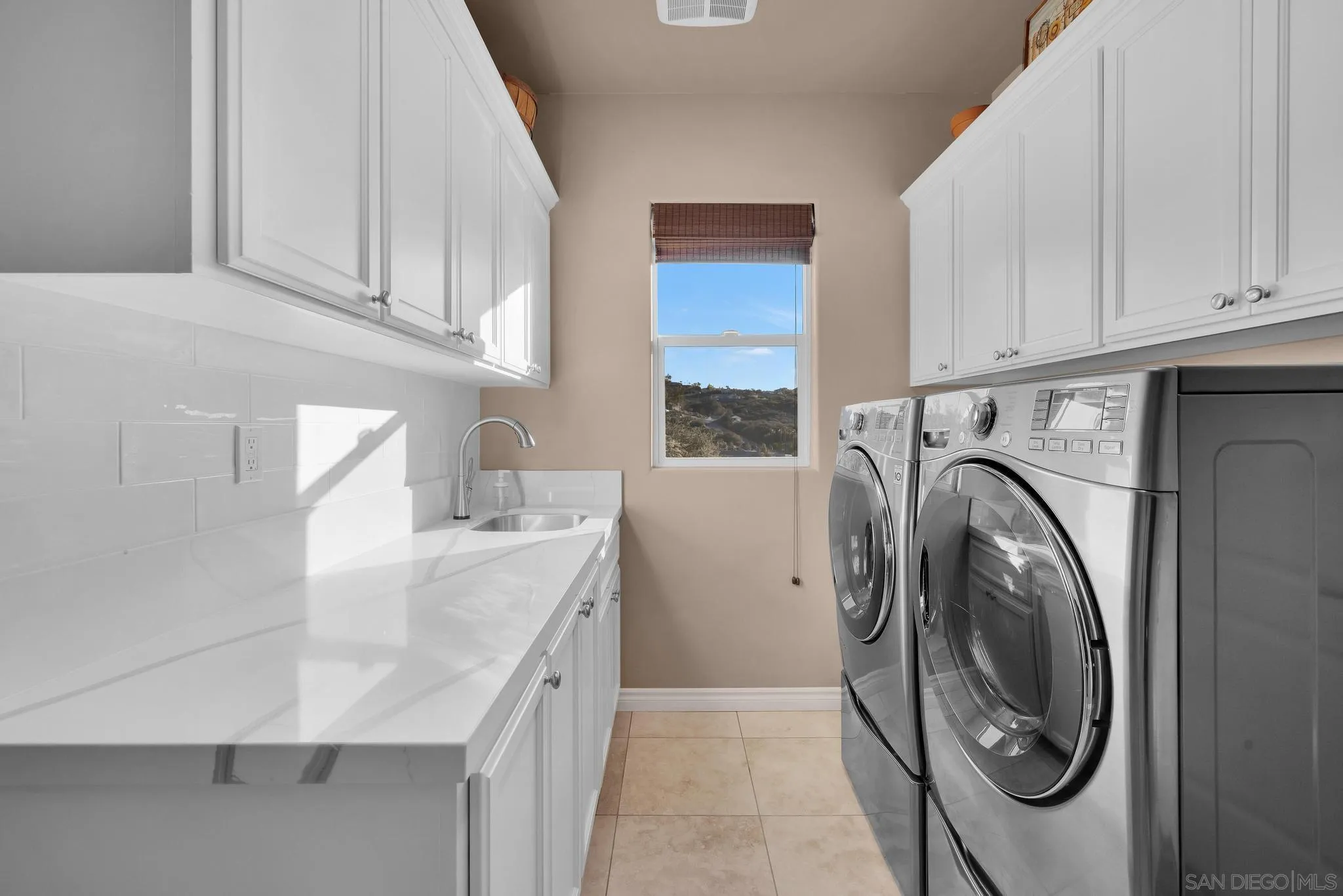 578 North Alpine Trail Road Alpine, CA 91901 - Photo 23 of 50 a utility room with sink dryer and washer