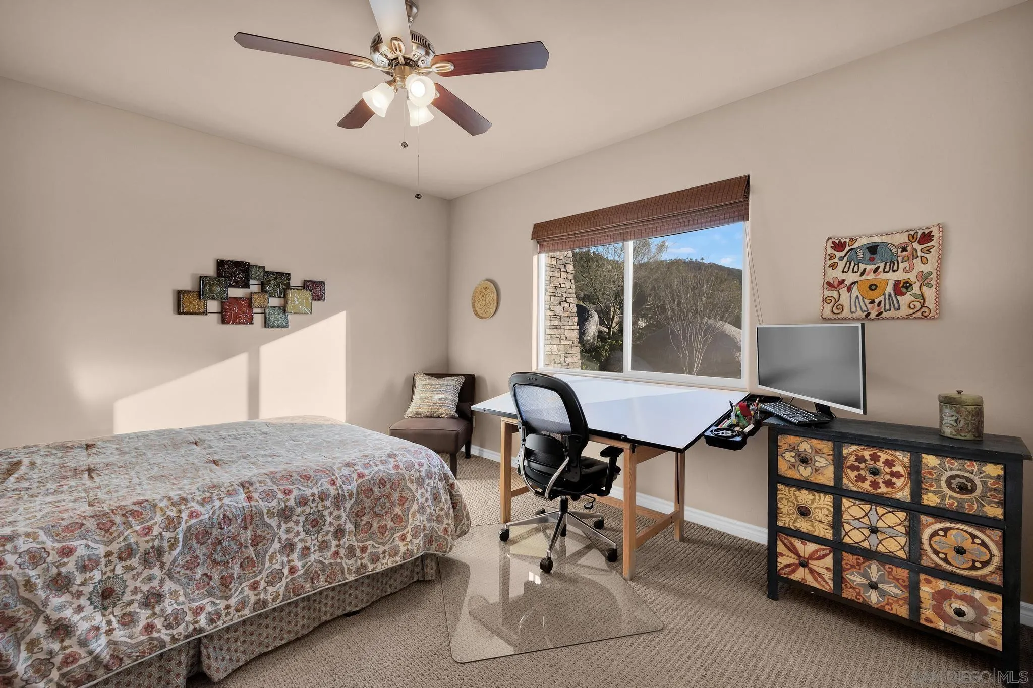578 North Alpine Trail Road Alpine, CA 91901 - Photo 27 of 50 a bedroom with a bed and a table in it