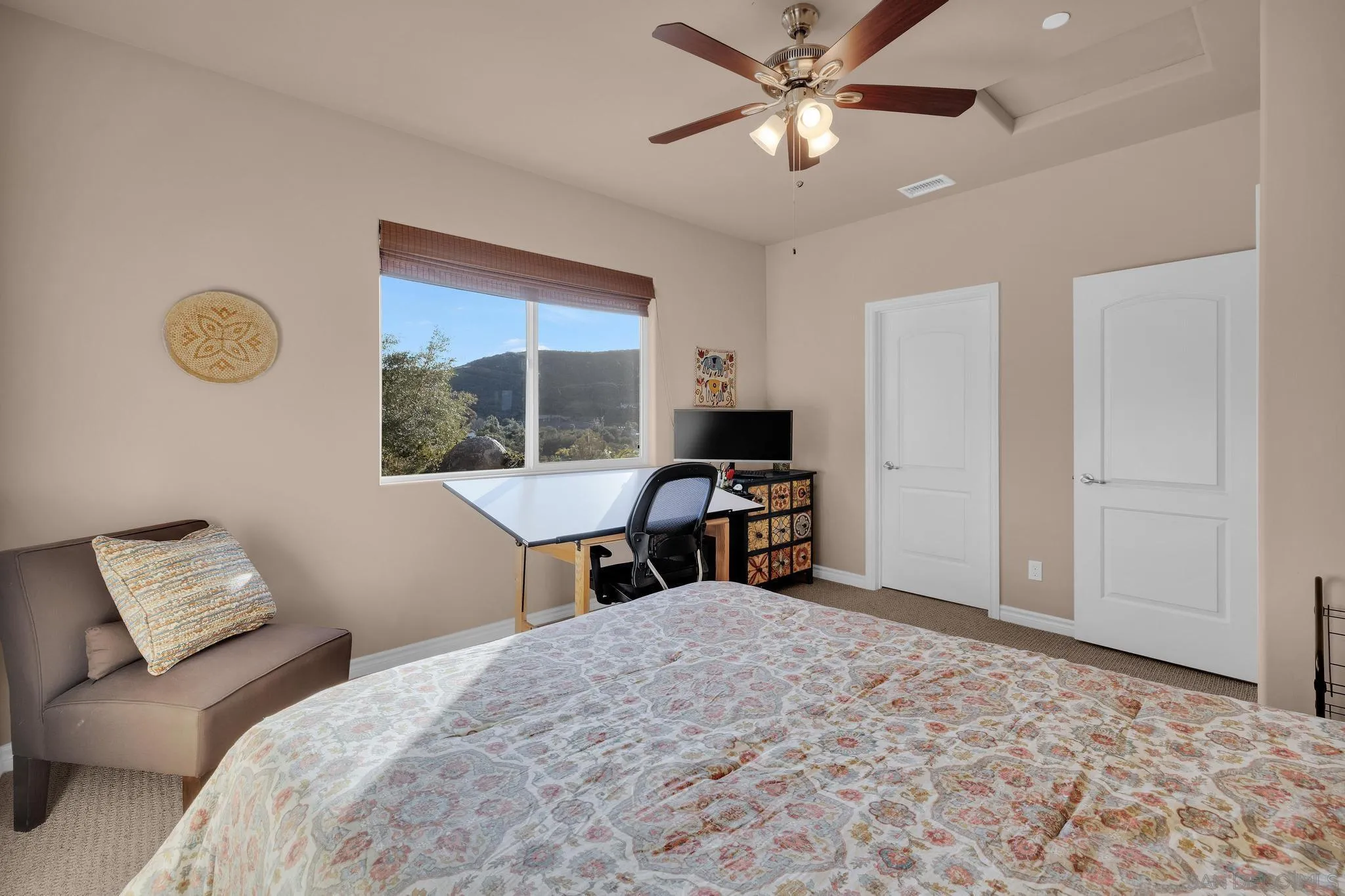 578 North Alpine Trail Road Alpine, CA 91901 - Photo 28 of 50 a bedroom with a bed and a window