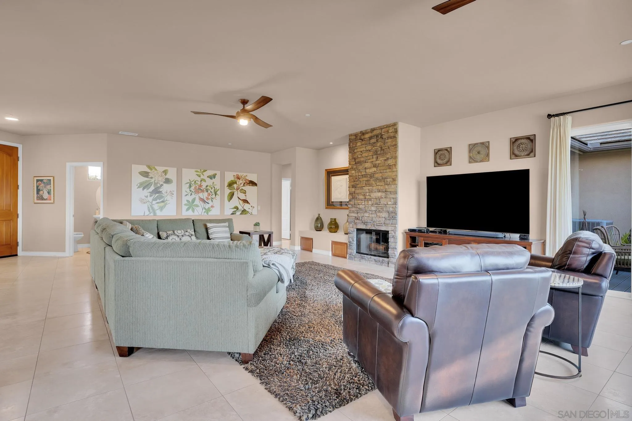 578 North Alpine Trail Road Alpine, CA 91901 - Photo 3 of 50 a living room with furniture and a flat screen tv